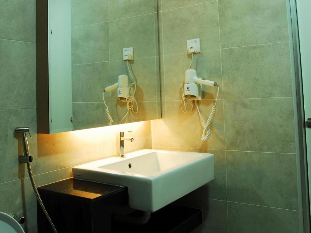 Lf Hotel Tapah Bagian luar foto
